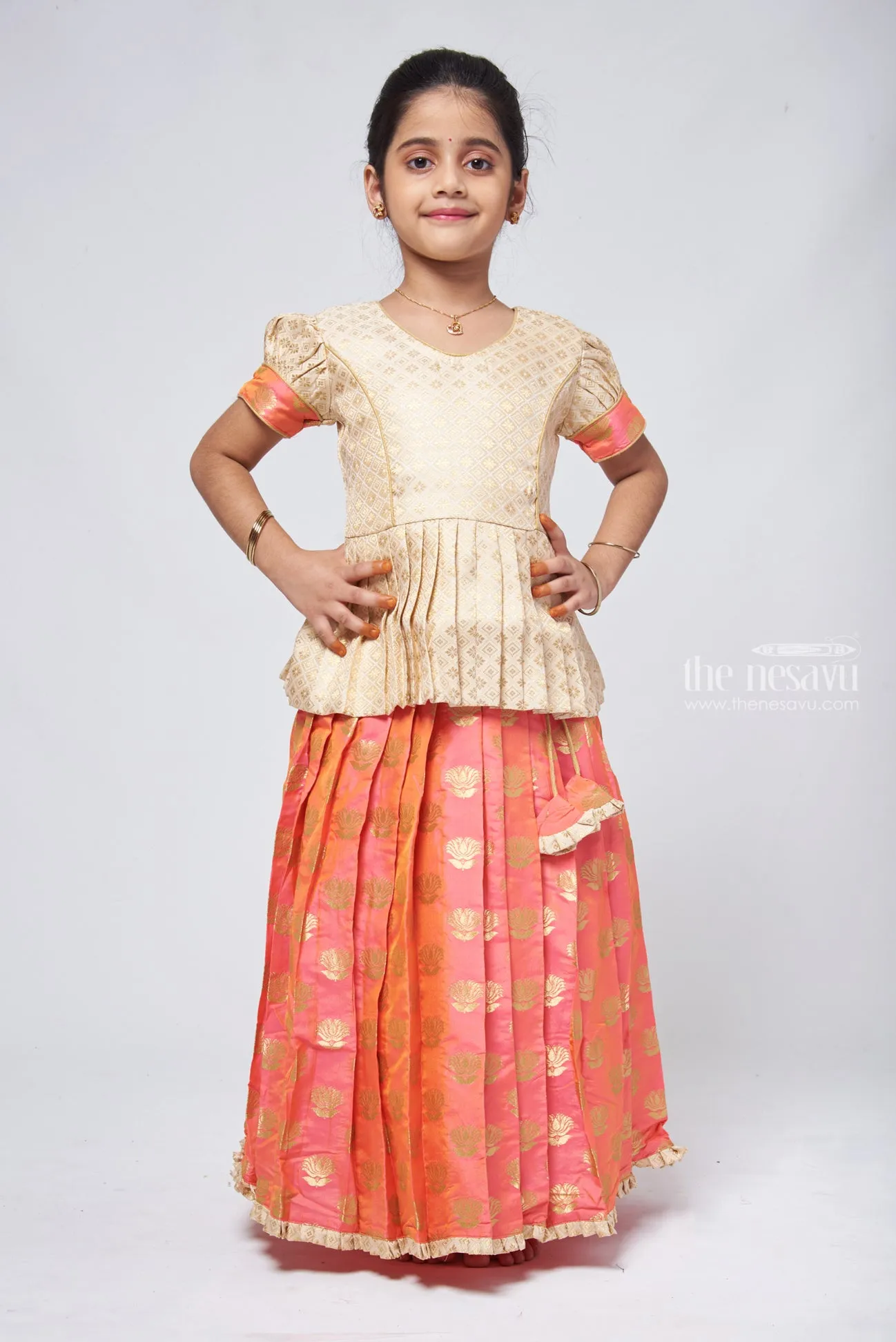 Butta Pleated Pink Skirt with Brocade Beige Silk Peplum Blouse: Festive Delight for Celebrations