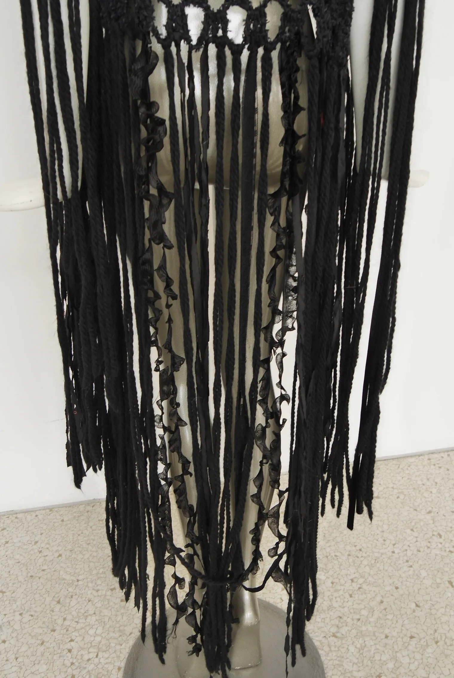 Slashed Bohemian style knit vest by Rodarte